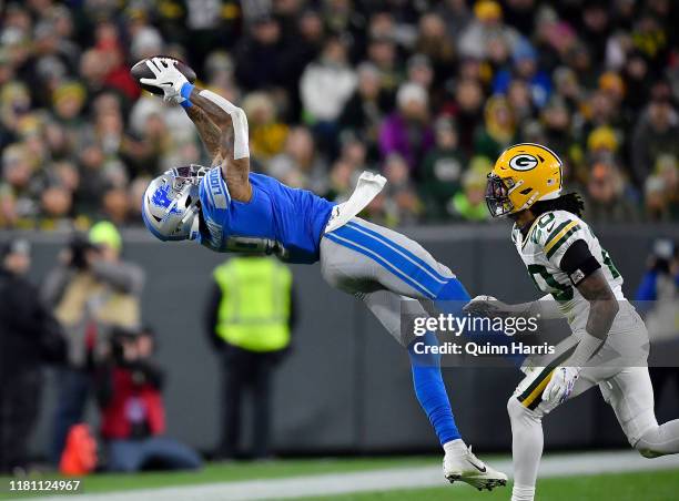 Kenny Golladay of the Detroit Lions attempts a catch in the third quarter Kevin King of the Green Bay Packers at Lambeau Field on October 14, 2019 in...