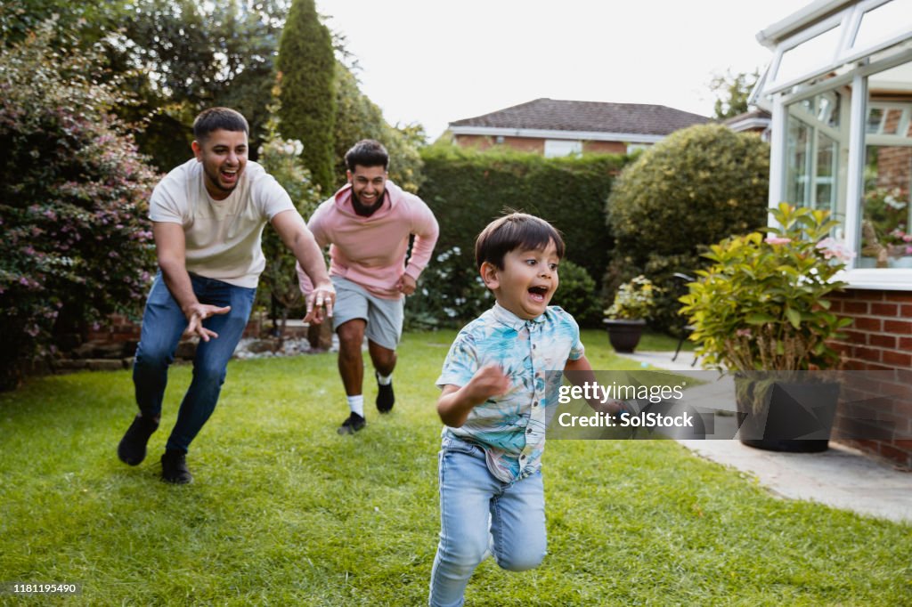 Family Play Time In The Garden