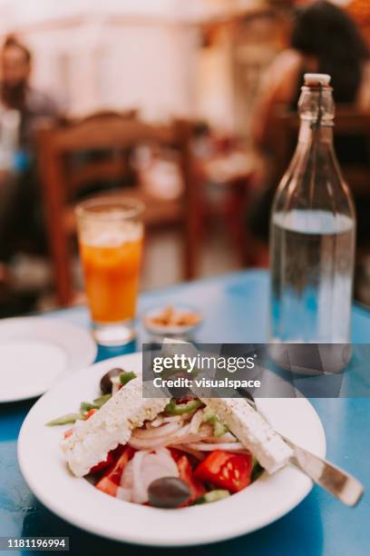 greek salad - traditional greek food - greek salad stock pictures, royalty-free photos & images