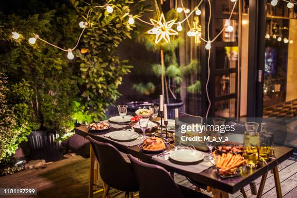 table ready for dinner party - dining table stock pictures, royalty-free photos & images