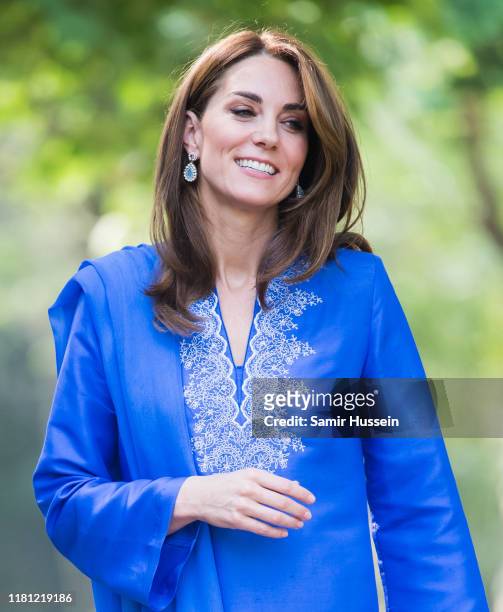 Catherine, Duchess of Cambridge visits the Margalla Hills National Park, which sit in the foothills of the Himalayas, to join children from three...
