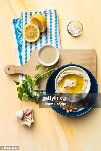 mezze: hummus and ingredients still life - humus israel stock pictures, royalty-free photos & images