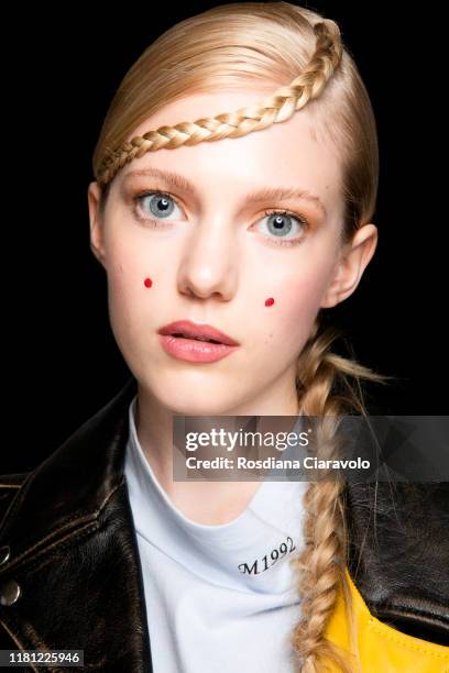 Model poses at backstage for the Digital Generation MACXM1992 Event at BASE Milano on October 09, 2019 in Milan, Italy.