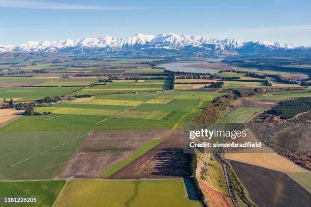 canterbury plain and the southern alps - irrigation canterbury stock pictures, royalty-free photos & images