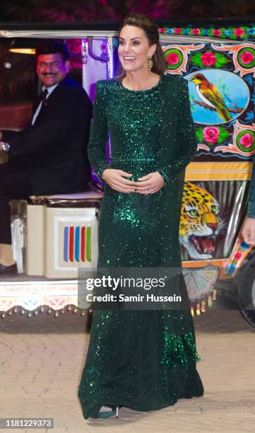 Catherine, Duchess of Cambridge and Prince William, Duke of Cambridge arrive by Tuk Tuk as they attend a special reception hosted by the British High...