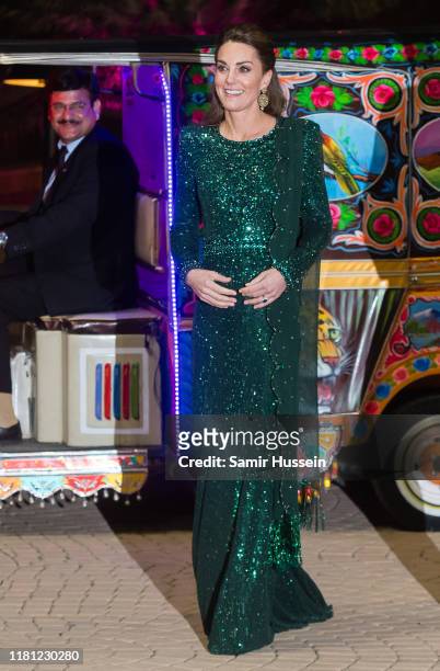 Catherine, Duchess of Cambridge and Prince William, Duke of Cambridge arrive by Tuk Tuk as they attend a special reception hosted by the British High...