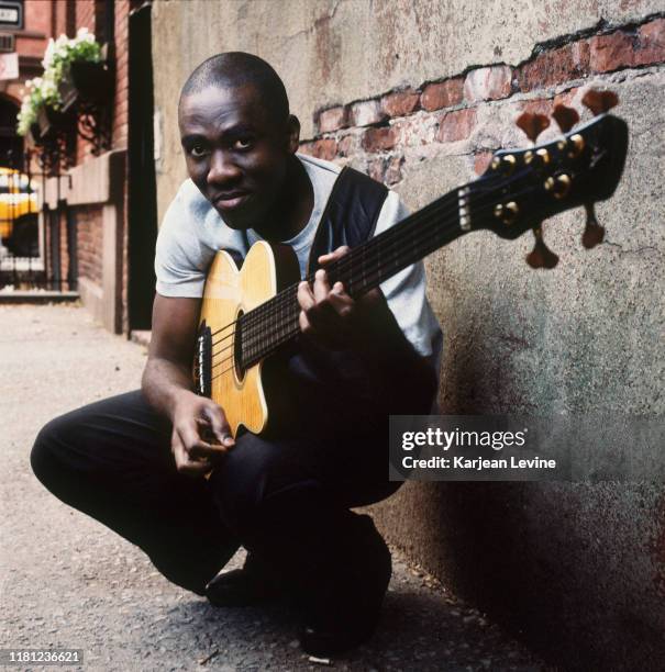 Cameroonian jazz bassist Richard Bona strikes a pose on a West Village street on May 26, 1999 in New York City, New York.