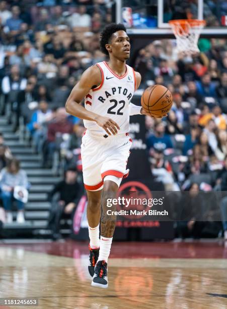 Patrick McCaw of the Toronto Raptors dribbles against the Chicago Bulls during their NBA basketball preseason game at Scotiabank Arena on October 13,...