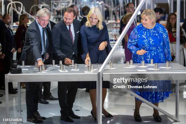 The director of the Buchmesse, Juergen Boos, Crown Prince Haakon of Norway, Crown Princess Mette-Marit of Norway and Norways Prime Minister Erna...
