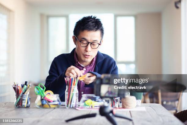 Paper Guy Tutorial 111 Paper Folding Tutorial Stock Photos, High-Res Pictures, and Images ...