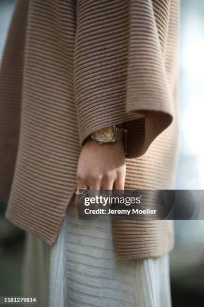 Aylin Koenig wearing Prada bucket hat, Unger sweater, Zara skirt on October 14, 2019 in Hamburg, Germany.