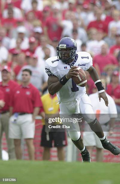 Quarterback Casey Printers of the Texas Christian University Horned Frogs rolls to his left during the NCAA football game against the Nebraska...