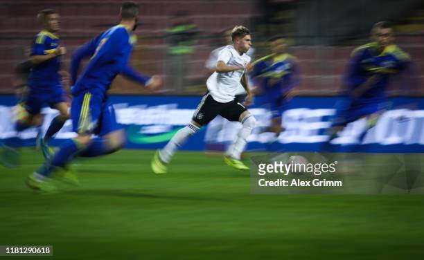 Robin Hack of Germany runs with the ball during the UEFA U21 Championship Qualifying match between Bosnia and Herzegovina U21 and Germany U21 at...