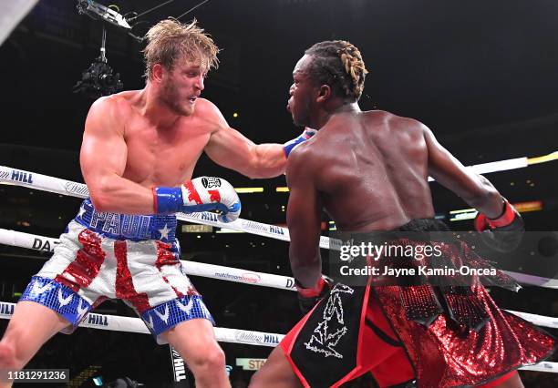 Logan Paul and KSI exchange punches their pro debut fight at Staples Center on November 9, 2019 in Los Angeles, California. KSI won by decision.