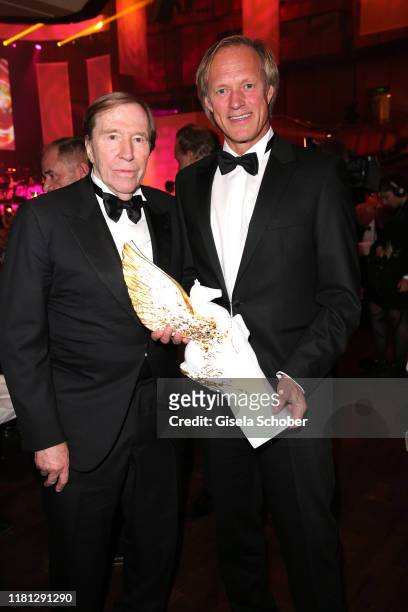 Guenter Netzer, Gerhard Delling with Pegasos Award during the German Sports Media Ball at Alte Oper on November 9, 2019 in Frankfurt am Main, Germany.
