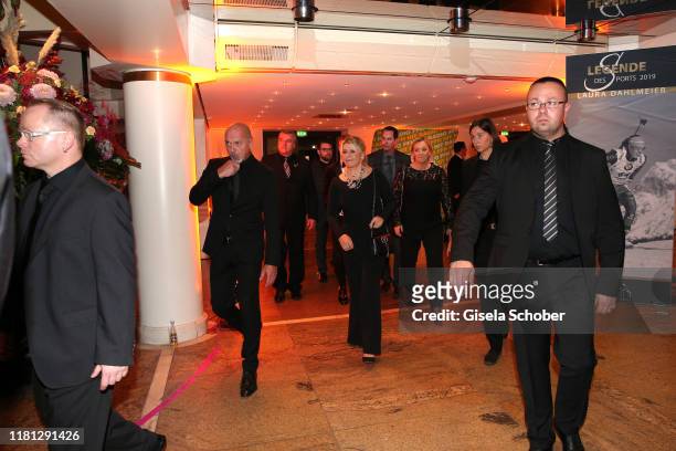 Corinna Schumacher and six bodyguards leave the party during the German Sports Media Ball at Alte Oper on November 9, 2019 in Frankfurt am Main,...