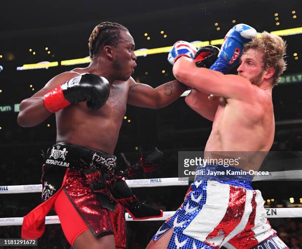Logan Paul and KSI exchange punches during their pro debut fight at Staples Center on November 9, 2019 in Los Angeles, California. KSI won by...