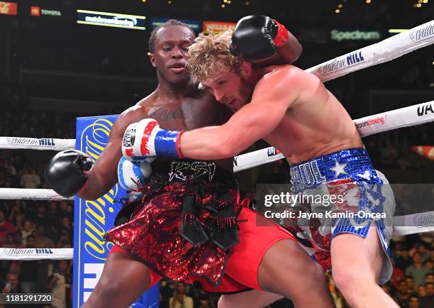 Logan Paul and KSI exchange punches during their pro debut fight at Staples Center on November 9, 2019 in Los Angeles, California. KSI won by...