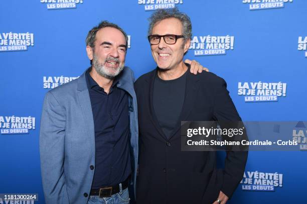 Bruno Solo and Gilbert Melki attend the "La Verite Si Je Mens, Les Debuts!" premiere At cinema le Grand Rex on October 15, 2019 in Paris, France.