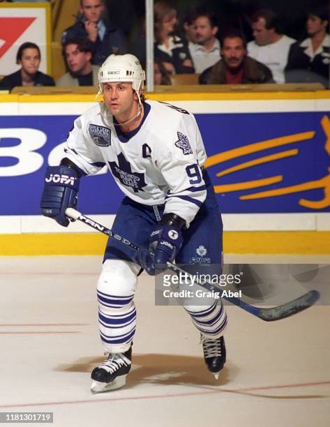 Doug Gilmour of the Toronto Maple Leafs skates against the St. Louis Blues during NHL game action on December 3, 1996 at Maple Leaf Gardens in...