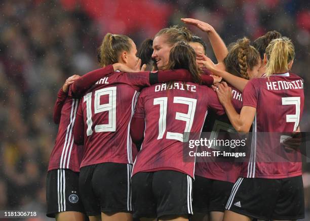 Alexandra Popp of Germany celebrates her goal with team matesduring the International Friendly between England Women and Germany Women at Wembley...