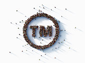 Human Crowd Forming Registered Trademark Symbol on White Background : Patent and Copyright Concept