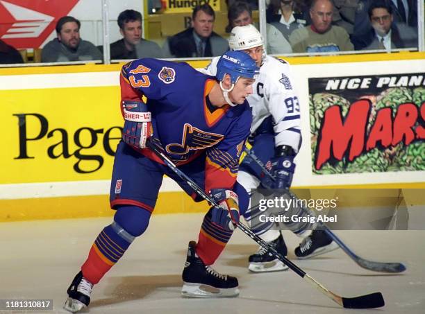 Libor Zabransky of the St. Louis Blues skates against Doug Gilmour of the Toronto Maple Leafs during NHL game action on December 3, 1996 at Maple...