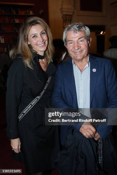 Karine Belly and her husband Martin Lamotte attend the "Palace" Theater Play at Theatre de Paris on October 15, 2019 in Paris, France.