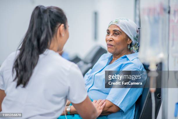 cancer patient receiving treatment stock photo - cancer illness stock pictures, royalty-free photos & images