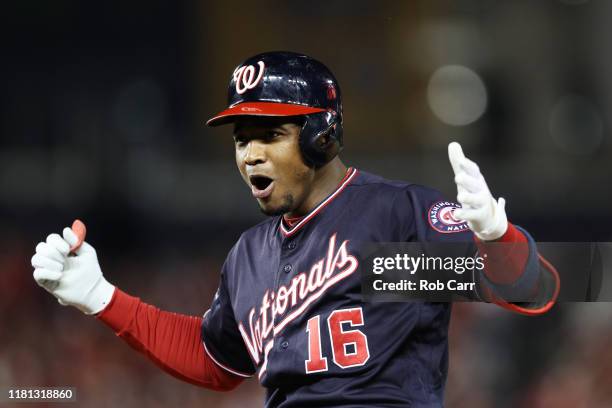 Victor Robles of the Washington Nationals celebrates his RBI single in the first inning against the St. Louis Cardinals during game four of the...