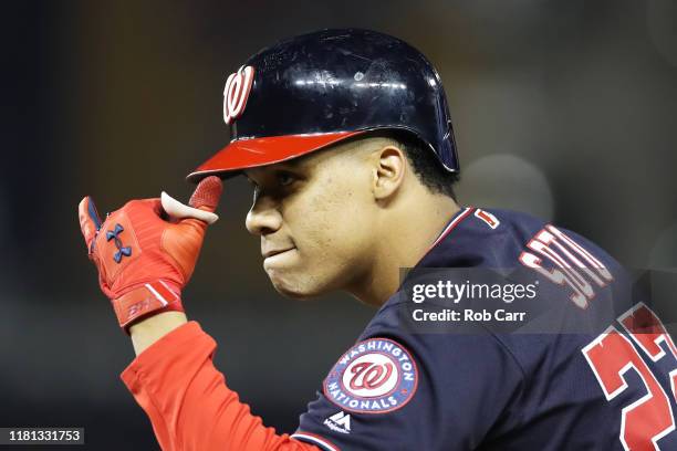 Juan Soto of the Washington Nationals celebrates his single in the seventh inning against the St. Louis Cardinals during game four of the National...