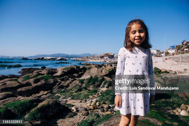 little girl in the coast - positivism stockfoto's en -beelden