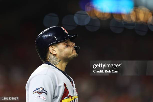 Yadier Molina of the St. Louis Cardinals walks to first after he hit with a pitch in the eighth inning against the Washington Nationals during game...