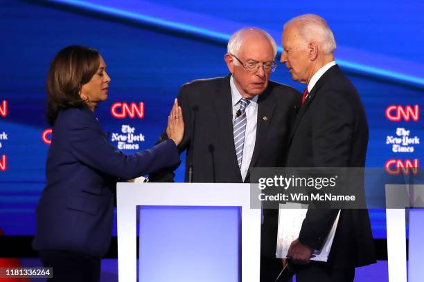 Sen. Kamala Harris , Sen. Bernie Sanders , and former Vice President Joe Biden interact after the Democratic Presidential Debate at Otterbein...