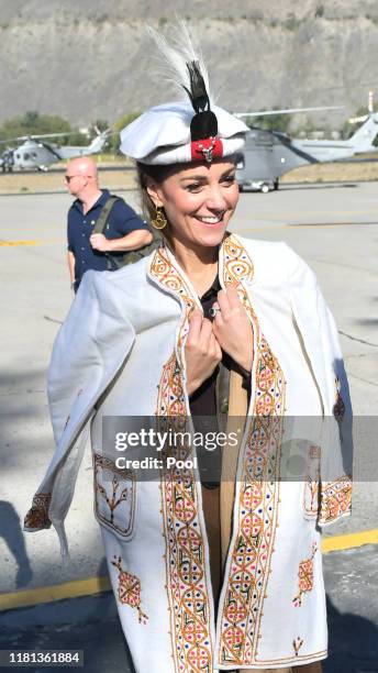 Catherine, Duchess of Cambridge is welcomed as the Duke and Duchess arrive by helicopter on October 16, 2019 in Chitral, Pakistan.