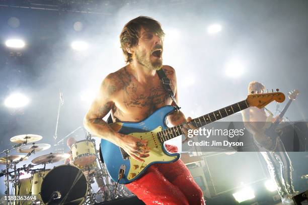 Simon Neil of Biffy Clyro performs live on stage during a one-off Q Awards show at The Roundhouse on October 15, 2019 in London, England.