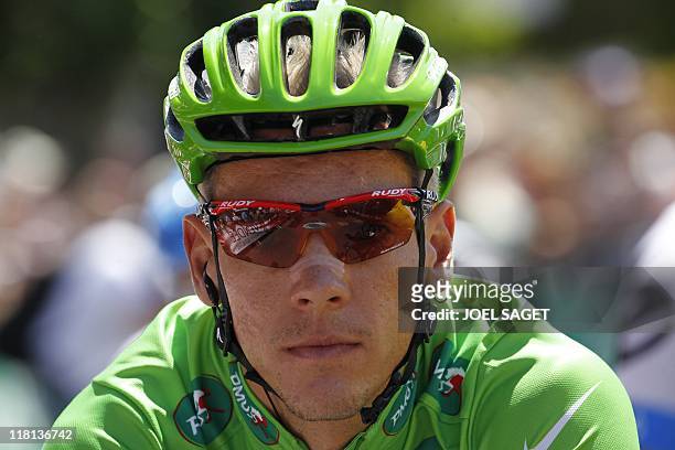 Green jersey of best sprinter, Belgium's Philippe Gilbert, waits for the start of the 198 km and third stage of the 2011 Tour de France cycling race...