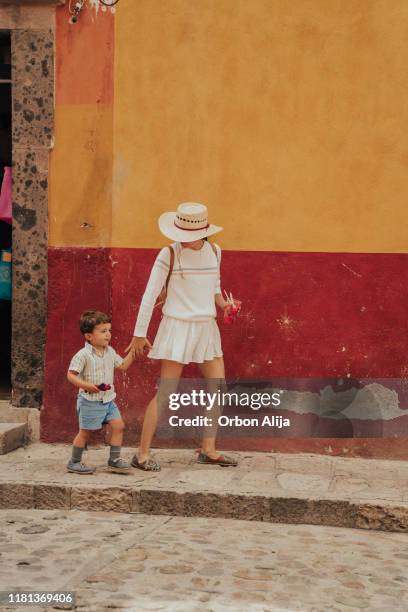 family travelling in mexico - colour block stock pictures, royalty-free photos & images