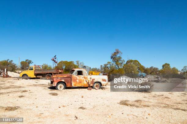 rustic old car ruins in the country - junkyard stock pictures, royalty-free photos & images