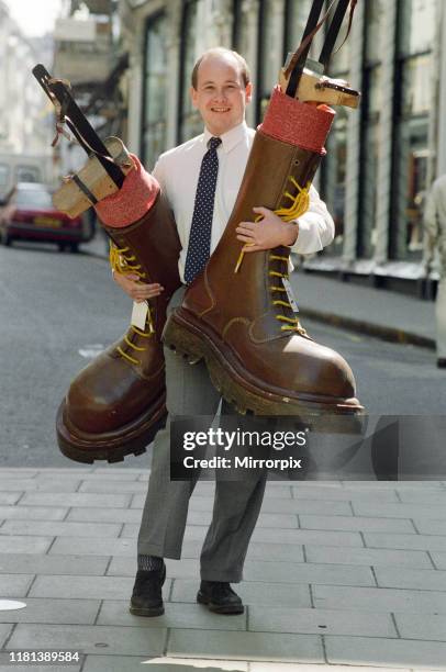 Sotheby's auction of Elton John items, Elton's famous Doc Martin boots were marched out of an auction for a record £11,000 - in he hands of their...