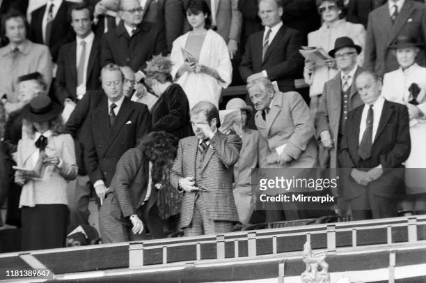 The 1984 FA Cup Final at Wembley Stadium. Final score Everton 2 v Watford FC 0. Watford chairman Elton John, with wife Renate Blauel, sheds a tear a...