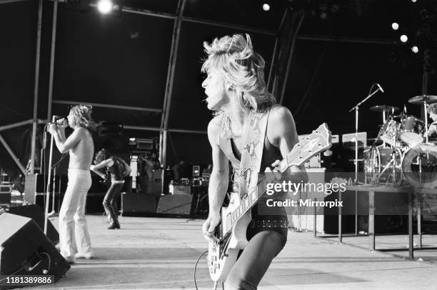 Lead singer Ozzy Osbourne, of Black Sabbath, and Randy Rhoads pictured in concert. 3rd August 1981.