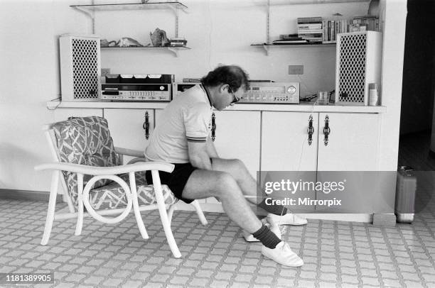 Elton John wearing a Watford F.C. Shirt on the Caribbean island of Montserrat. Elton is on the island to record his new album at AIR studios. October...