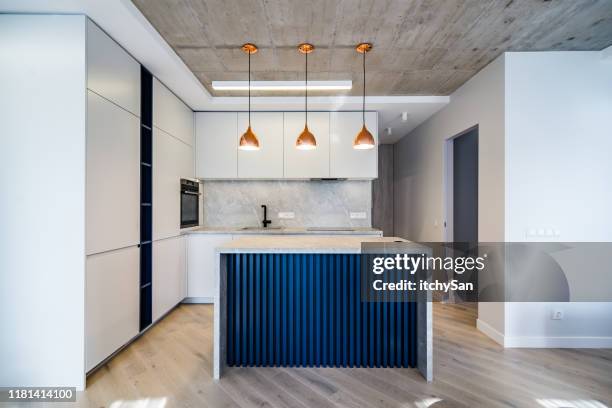 modern kitchen front view - kitchen island stock pictures, royalty-free photos & images