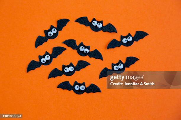 flying bats - bats flying stock pictures, royalty-free photos & images