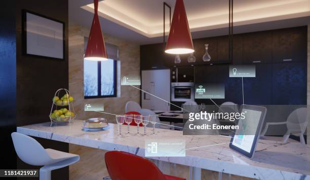 smart home control  in kitchen - intelligence stock pictures, royalty-free photos & images