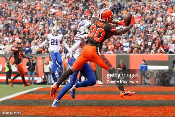 Jarvis Landry of the Cleveland Browns catches a pass for a touchdown while being defended by Levi Wallace of the Buffalo Bills during the first...