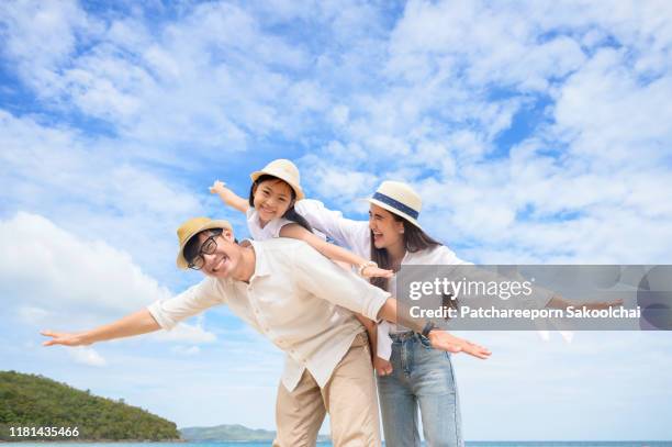 family vacation on the beach - tourist mother father child thailand stock pictures, royalty-free photos & images