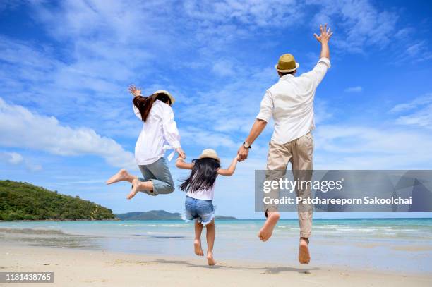 family vacation on the beach - tourist mother father child thailand stock pictures, royalty-free photos & images