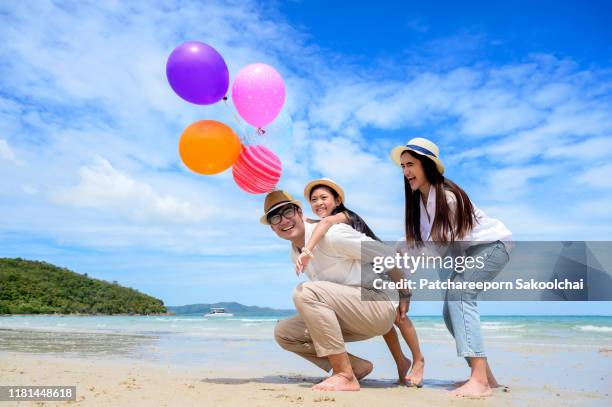 family vacation on the beach - tourist mother father child thailand stock pictures, royalty-free photos & images
